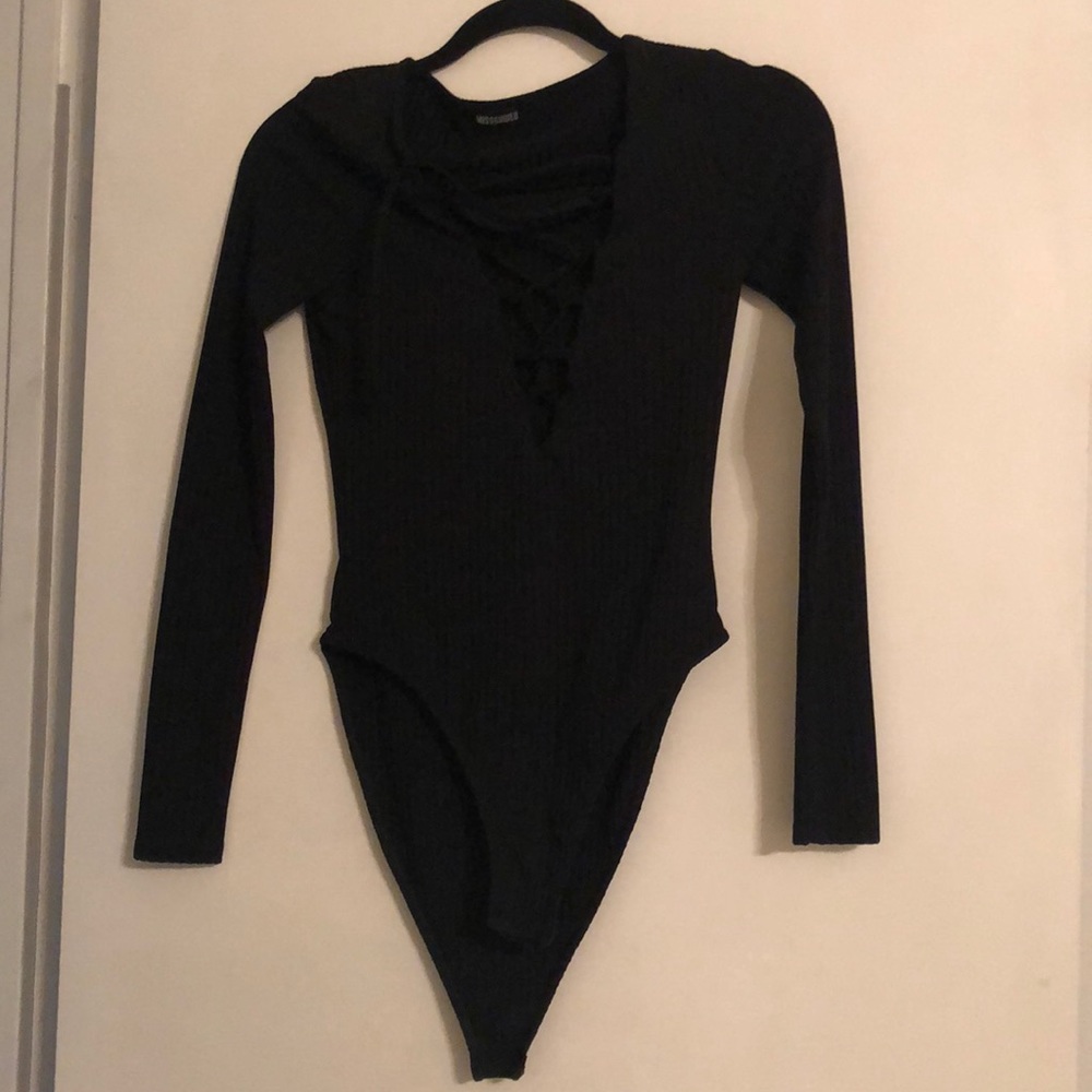 Thick form fitting bodysuit worn once